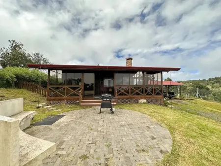 Cabaña Gota de Miel Отели в г. Сан Исидро