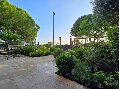 Suite with private outdoor space and garden view