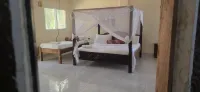 Luxurious 4-Bedroom Holiday House with Pool Access in Diani Beach - 2-Star