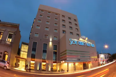 Howard Johnson Villa María Hotel y Casino Отели в г. 