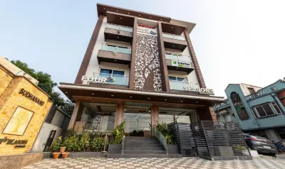 Treebo Four Seasons โรงแรมใกล้Lalitha Mahal Palace Gateway