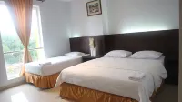 Guest House New Mulia Hôtels à : Salahutu