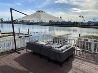 Waterfront modern home Sleeps 6 near Marina w/ Hot Tub, Large Deck, and EVCharge
