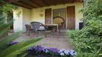 Villa near the sea submerged in greenery