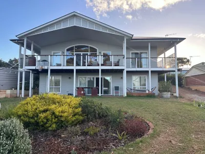 A family friendly house with breath-taking sea views in a great location.
