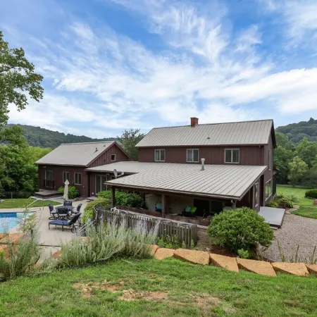 Hillside Haven on expansive grounds, heated pool, firepit, bocce court and more!