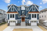 Beautiful Bayfront w/ Heated Pool & Dock.  6 Bedrooms, all w/ Ensuite Bathrooms.