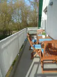 Bright and friendly apartment with comfortable amenities near the beach.