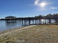 Super clean Waterfront home with private boat launch and fishing pier on site.