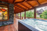 Ultimate Group Getaway: Modern Cabin w/ Hot Tub, Foosball, Playset & Arcade - 5-Star