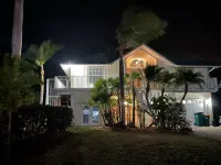 Private Waterfront home with pool and hot tub with large dock in Isle of Capri Hotels near Endless Summer Adventures