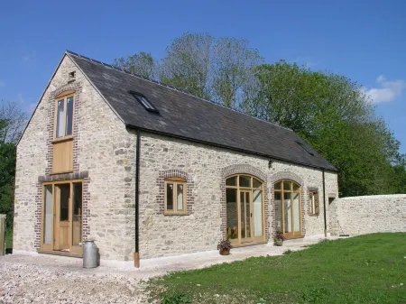 Barn conversion, quiet location and  heated swimming  pool ( from mid May)