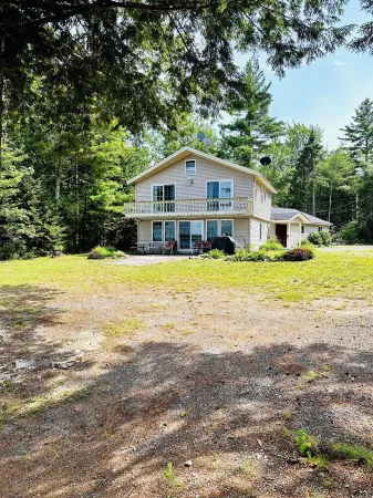 Beautiful and private lakefront home on the sandy shores of South Twin Lake
