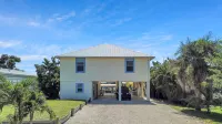 3 bed, 3 bath home, heated/cooled pool on quiet canal. Quick boat access to gulf