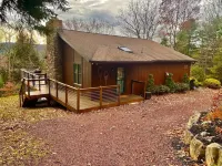 Cozy chalet with hot tub and ski resort view