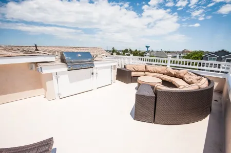 Seaside Beach Mansion w/9 Bedrooms, 8 Full Baths, Pool, Elevator & Rooftop Deck.