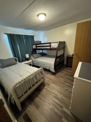 The Hut.  Cozy 2-bedroom mobile home on peaceful Reelfoot Lake with boat shed