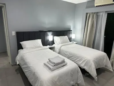 GUGASUITES Hoteles cerca de Plaza Alfonsina Storni