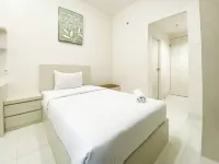 Minimalist and Homey Studio Room at Amartha View Apartment