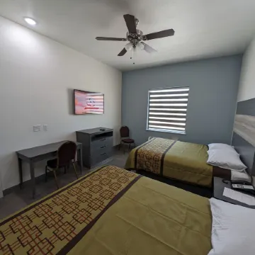 Texas Bungalows Hotel and Hotel Que at I35 Austin Pflugerville