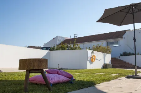 Entre Vinhas & Mar Отели рядом с достопримечательностью «Praia D'El Rey Golf Course»