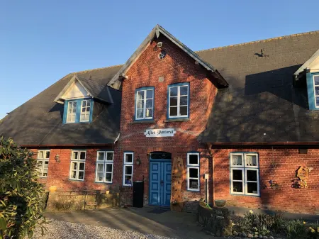 Altes Pastorat Langenhorn Отели в г. Лангенхорн