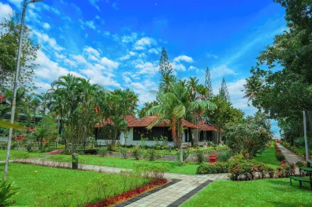 Paradise Heritage Resort Отели в г. Кумараком