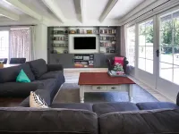 A Detached Bungalow with Outdoor Fireplace Covered Terrace and Pond in a Forest Plot Hotels in Westerveld