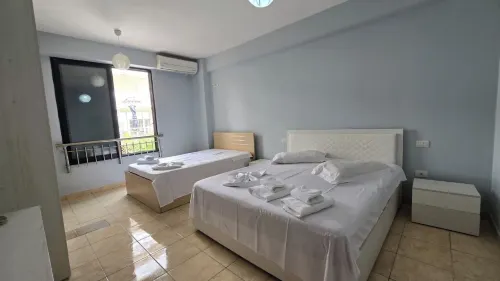 Tirent Apartment - Cozy Bedrooms Stay by Golem Beach.