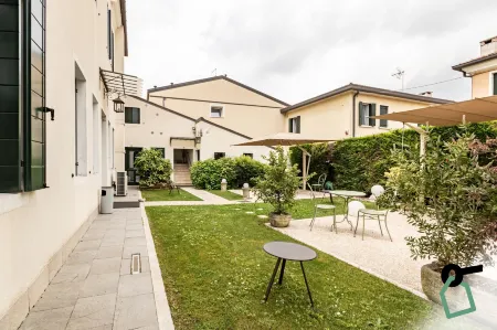 HOTIDAY Room Collection - Dolo Отели в г. Доло