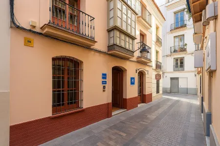 Cream Boutique Málaga Отели рядом с достопримечательностью «Хибральфаро»