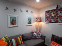 Itzy Bitzy house is colourful, cosy, fully fenced with sea views