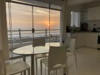 Ocean Breeze Residential-Unit 401 Отели в г. Уанчако