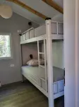 New vacation home with 2 terraces, right by the sea - a dream surrounded by forest