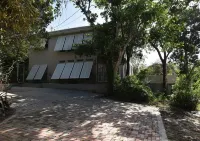 Quiet, private nature retreat with pool and ocean views. Hotels near East End Lighthouse Park
