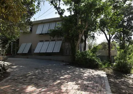 Quiet, private nature retreat with pool and ocean views.