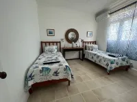 Serene and Spacious Beachfront Condo with Pool.  Amazing views. Gated security.