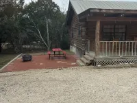"Bearly Beehavin" 2-bdrm 1 bthrm cabin  with WiFi, AC.  Unwind & relax in ConCan Hotels in Concan