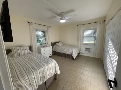 Tastefully Designed, 1st Floor Corner Condo, Steps from the Beach!