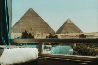 Turquoise Pyramids & Grand Egyptian Museum View Hotel - Mountain view