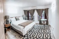 Serene Thatched Roof Retreat in Faerie Glen, Pretoria