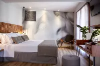 Apollon Library Suites Hotels near Frigo Solutions