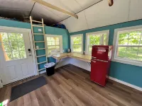 Meadow Riverfront Cabin Hotels in Wilderness