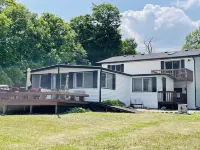 Lake Escape with Paddle Boards, Fire Pit & Game Room