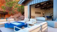 Cliffside Camelback Estate with Waterfall Pool, Bar and Epic Views