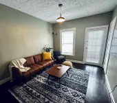 2-bedroom apartment in downtown Elkins with AC, a balcony, and WiFi.