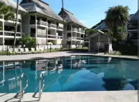 Tropical Garden Condo with Pool, Kitchen, and A/C!