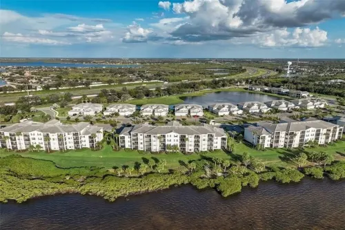 NEW MODERN COASTAL CONDO……GORGEOUS RIVER VIEWS!