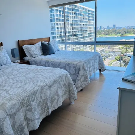 Beach and city views in condo with backyard access to beach and walkable town.