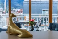 Merano center penthouse with terrace, garage, bike room and infrared sauna.